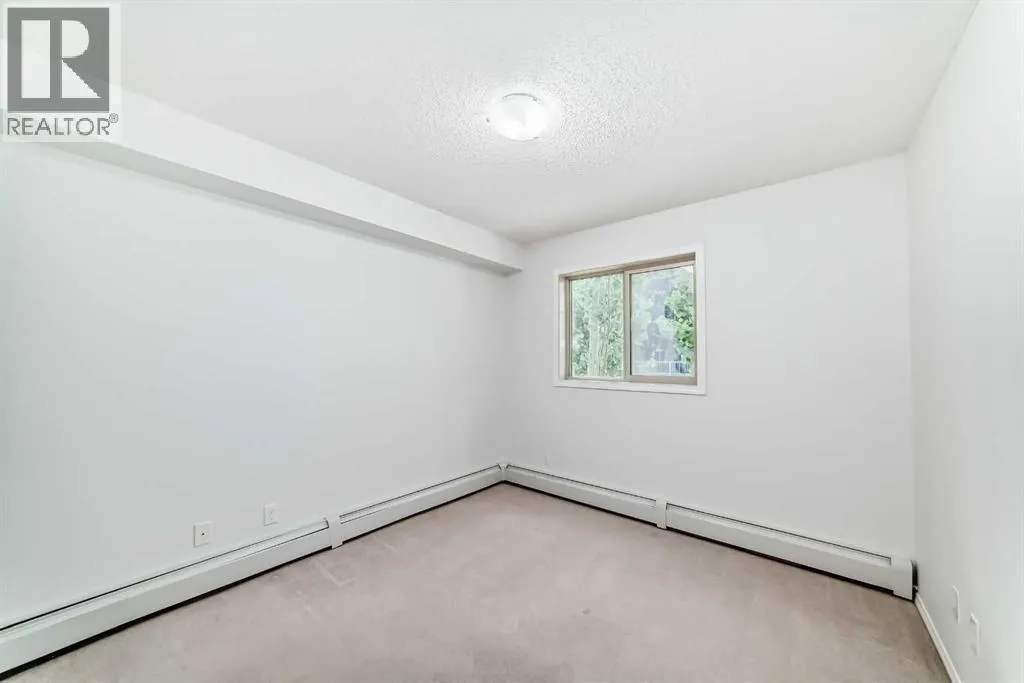 9113, 403 Mackenzie Way SW