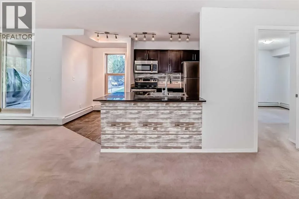 9113, 403 Mackenzie Way SW