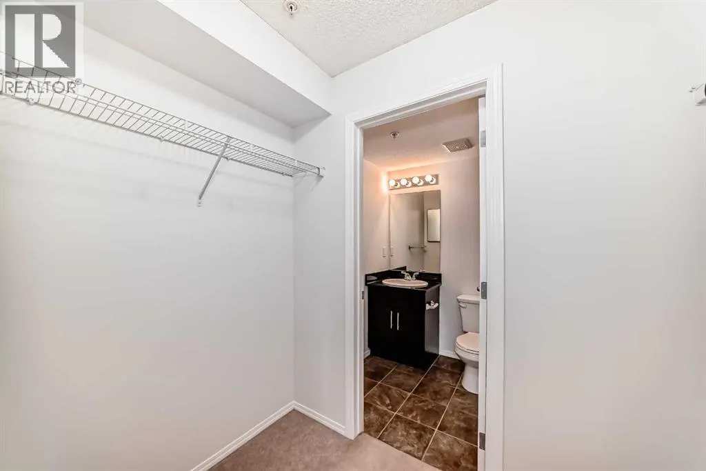 9113, 403 Mackenzie Way SW