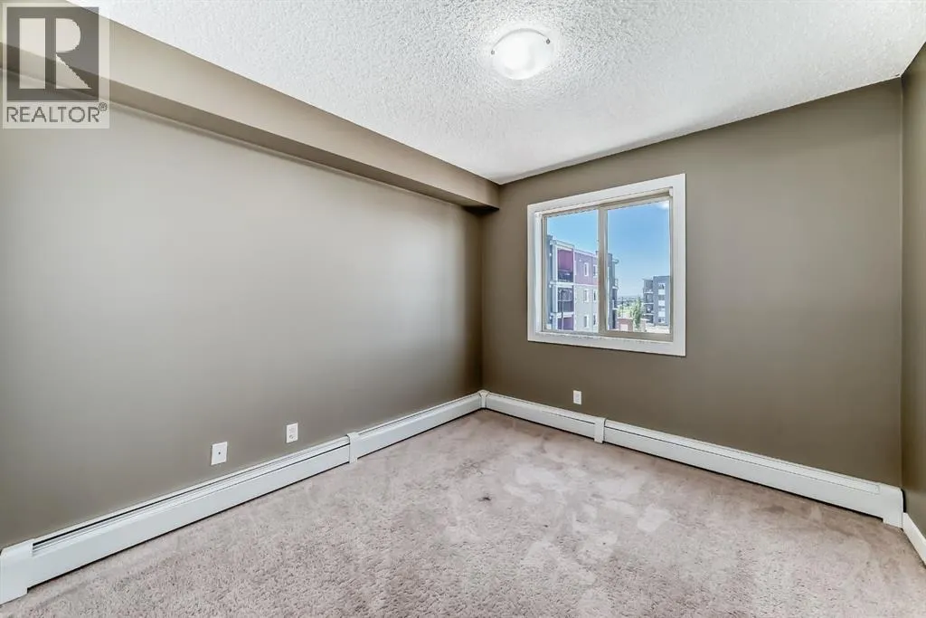 302, 15 Saddlestone Way NE