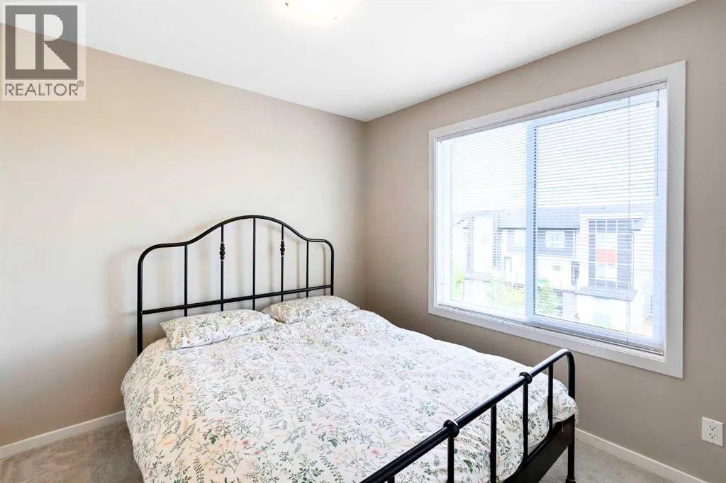 202, 110 Redstone  NE