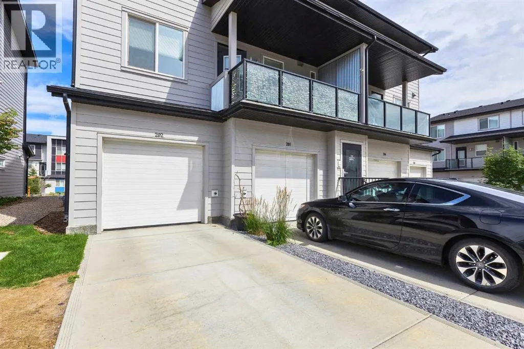 202, 110 Redstone  NE