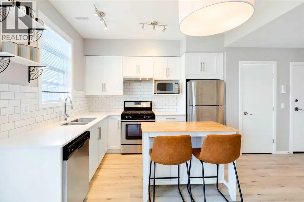 202, 110 Redstone  NE