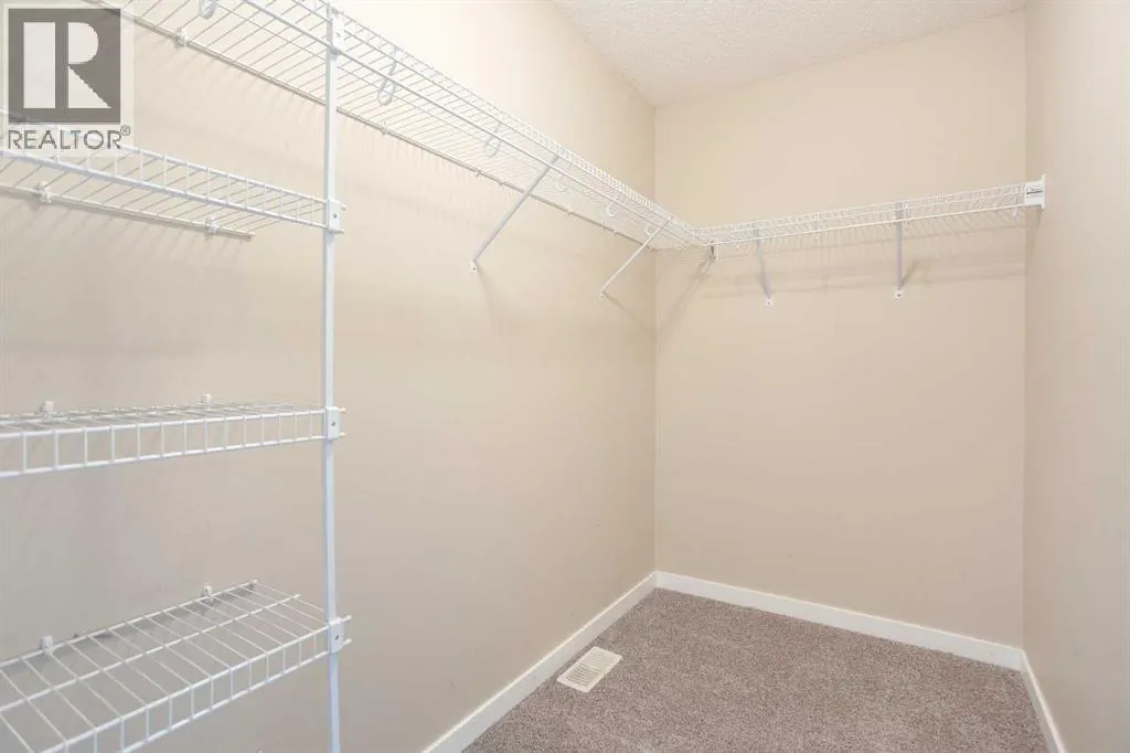 9 Cougar Ridge Rise SW