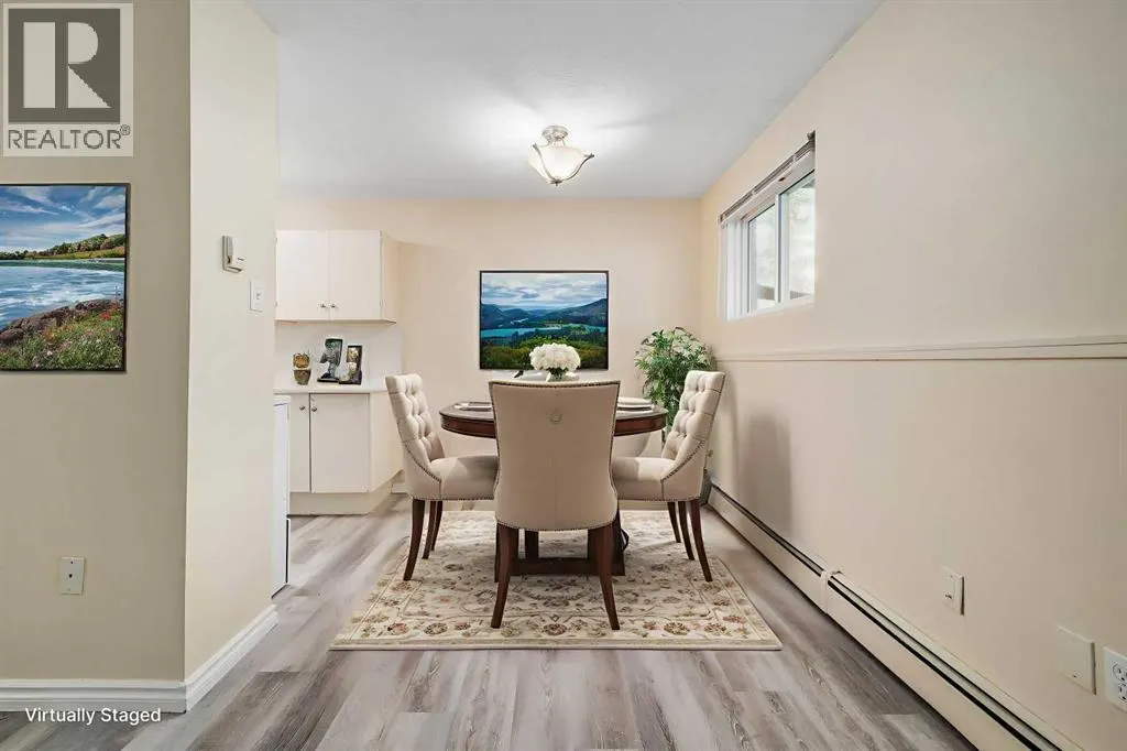 803, 11620 Elbow Drive SW
