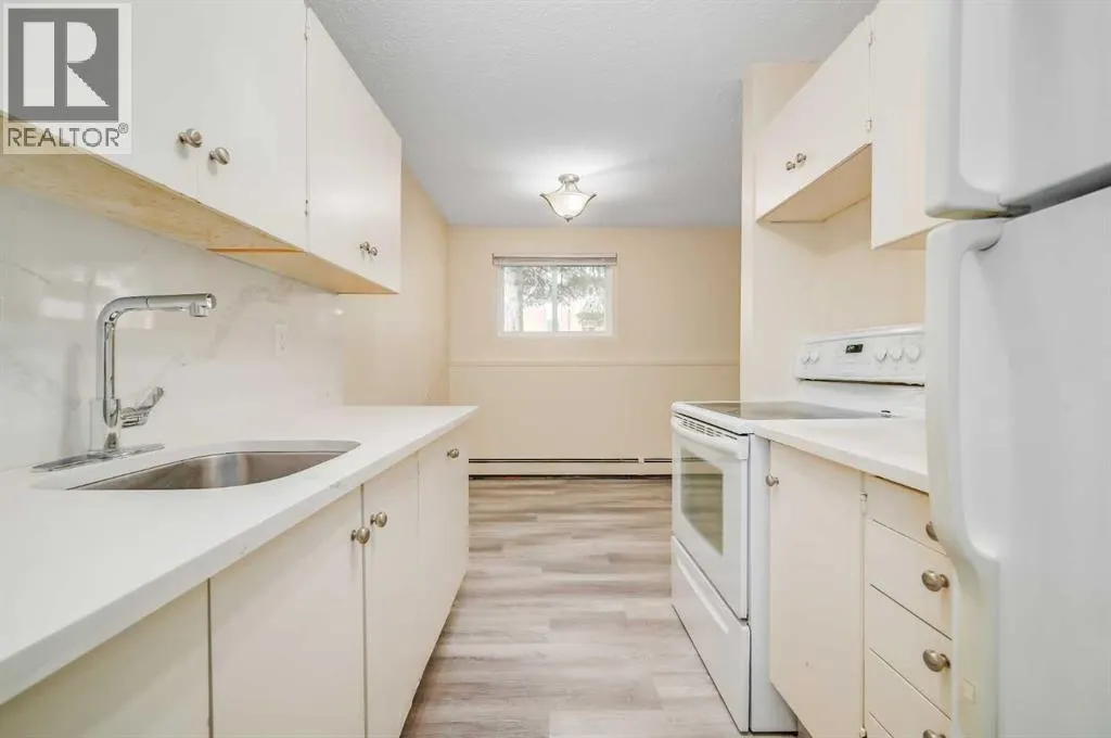 803, 11620 Elbow Drive SW