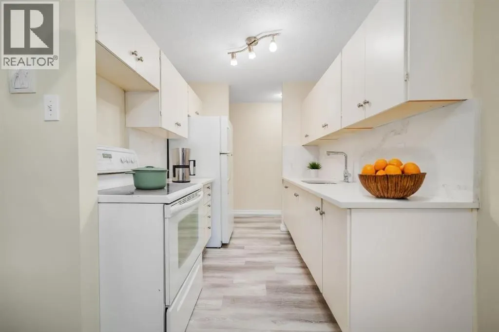 803, 11620 Elbow Drive SW