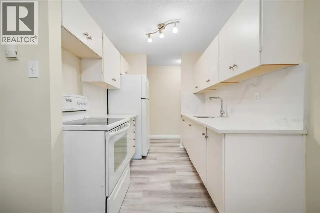 803, 11620 Elbow Drive SW