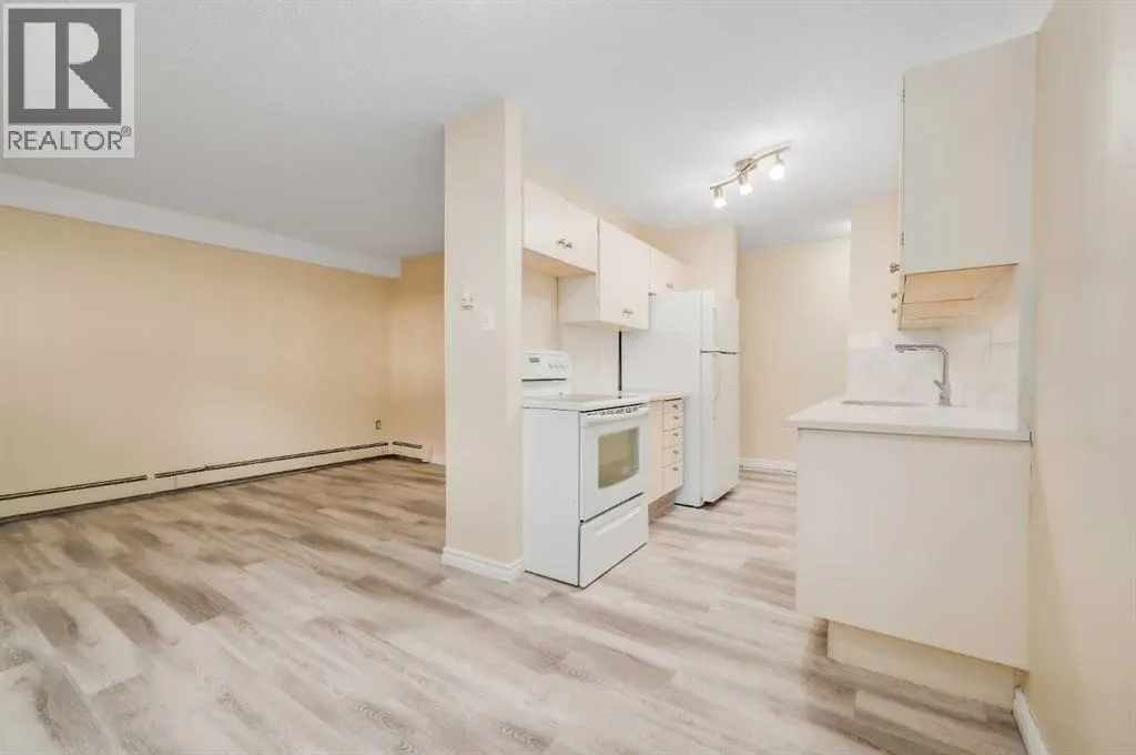 803, 11620 Elbow Drive SW