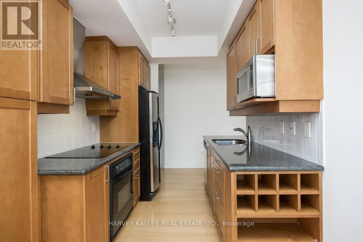 302 - 77 MCMURRICH STREET