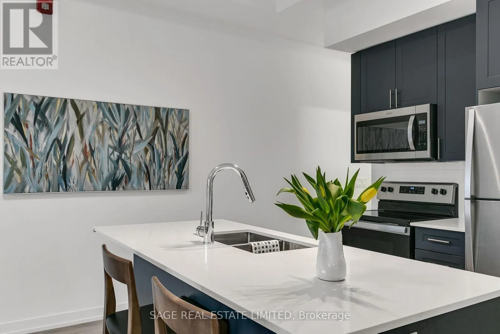 103 - 3686 ST CLAIR AVENUE E