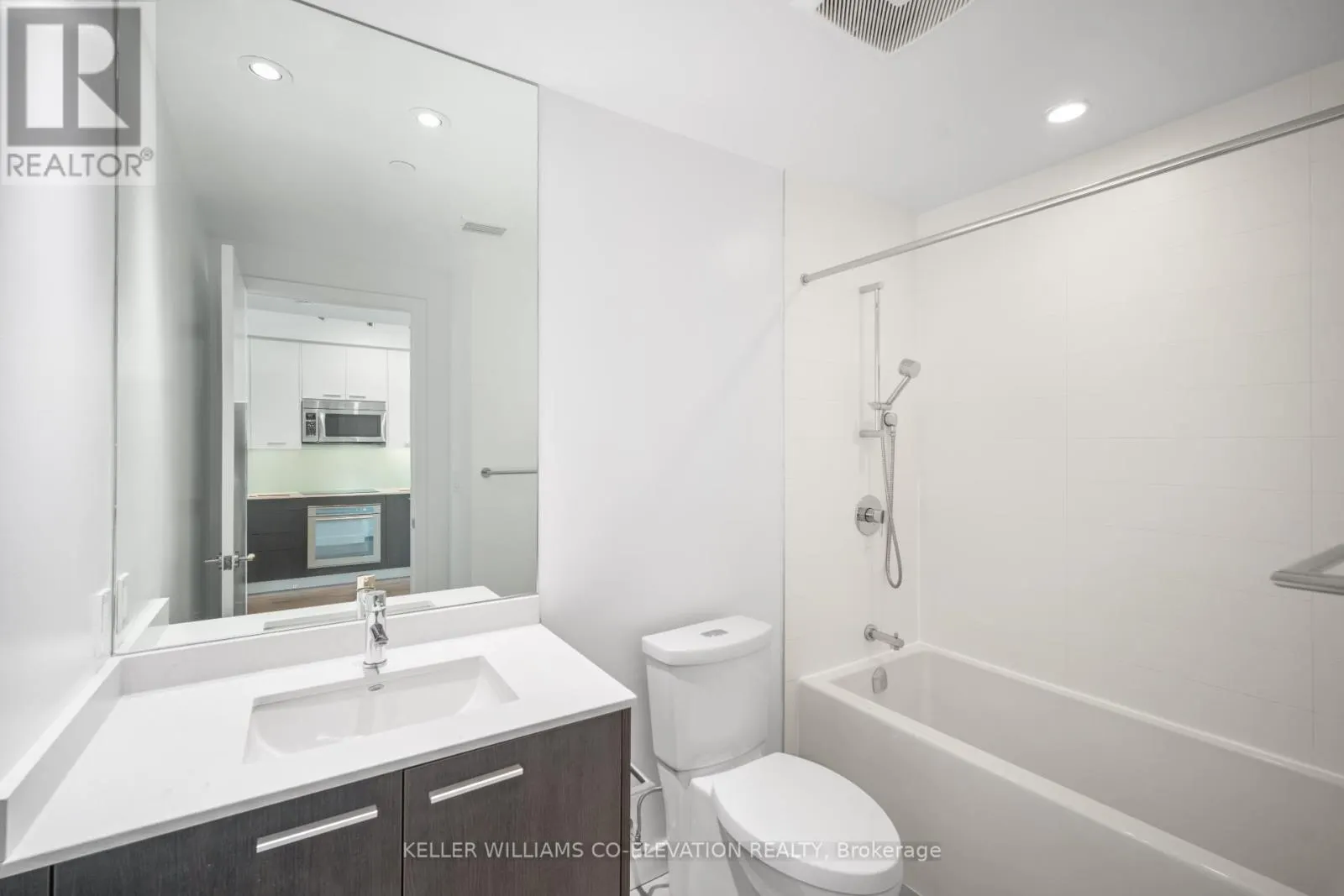303 - 1075 QUEEN STREET E