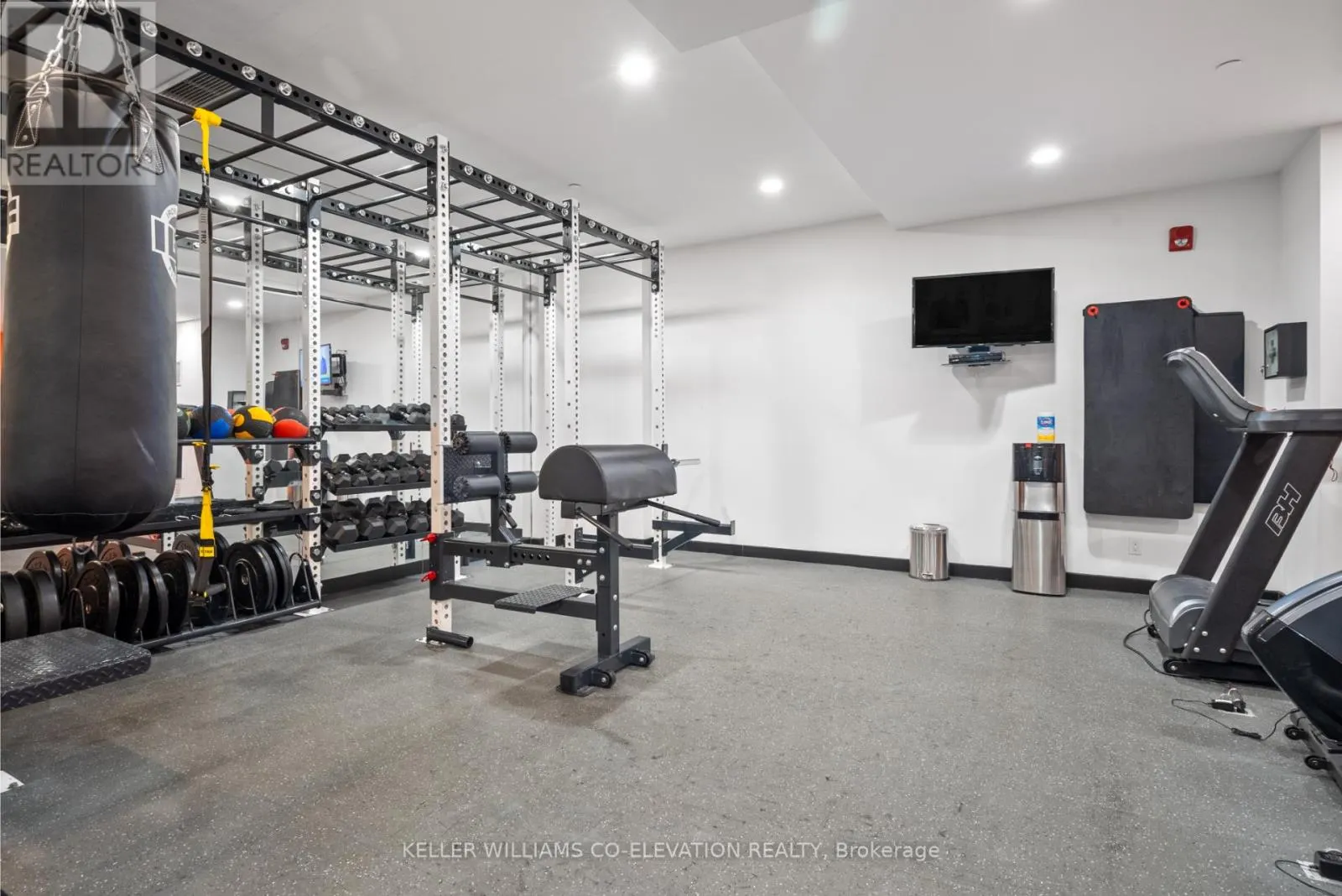 303 - 1075 QUEEN STREET E