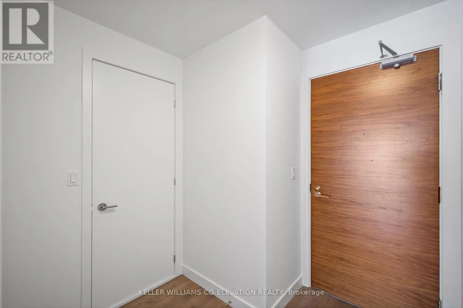 303 - 1075 QUEEN STREET E