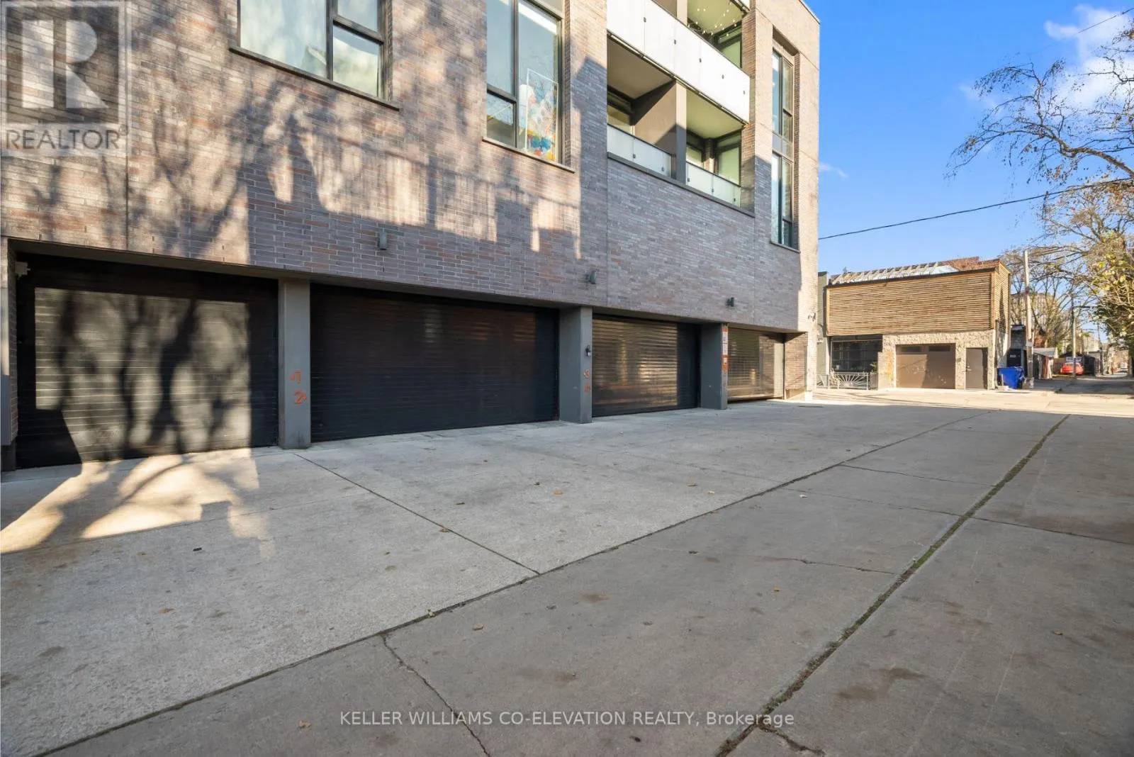 303 - 1075 QUEEN STREET E