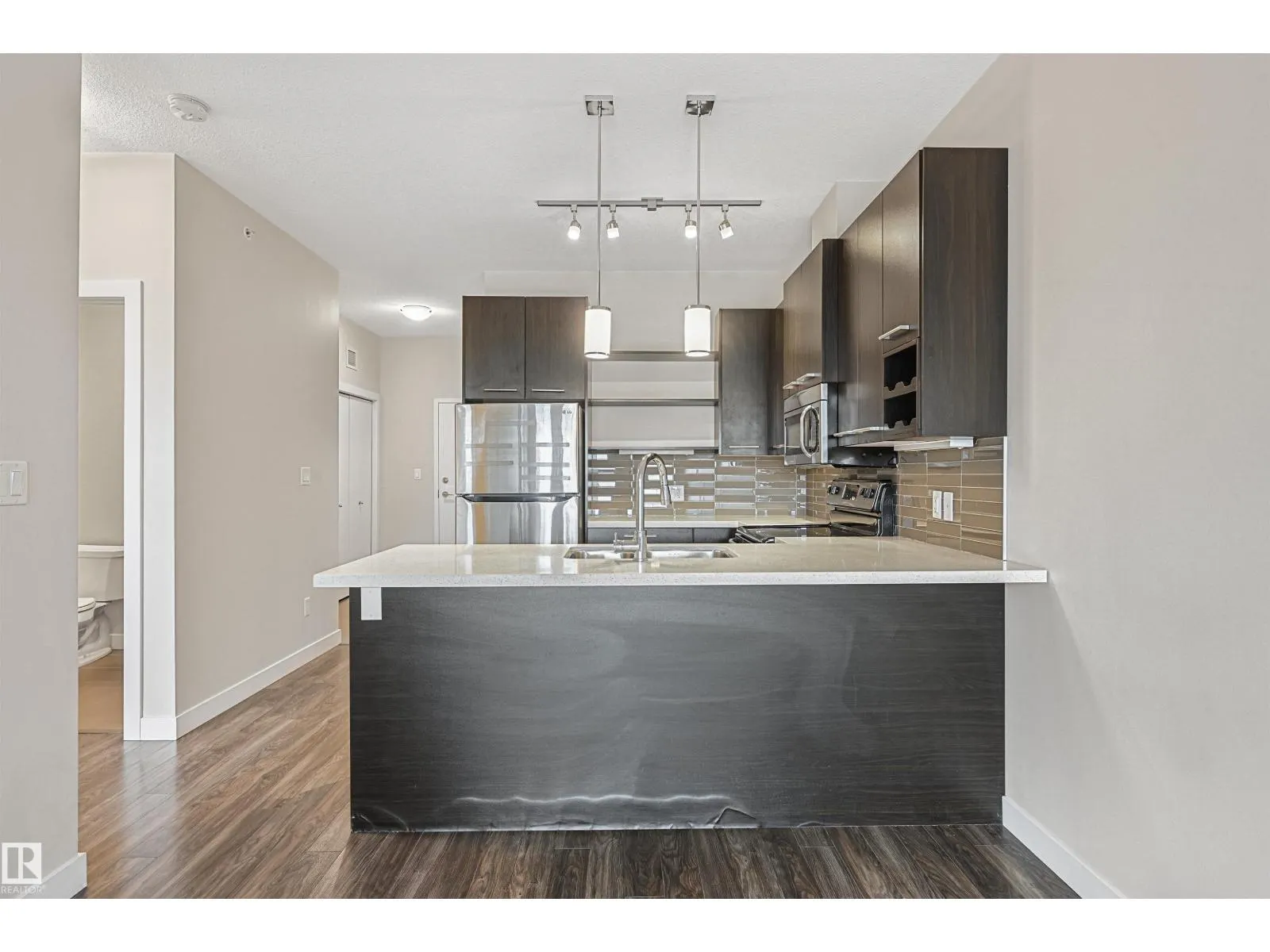 #403 10418 81 AV NW