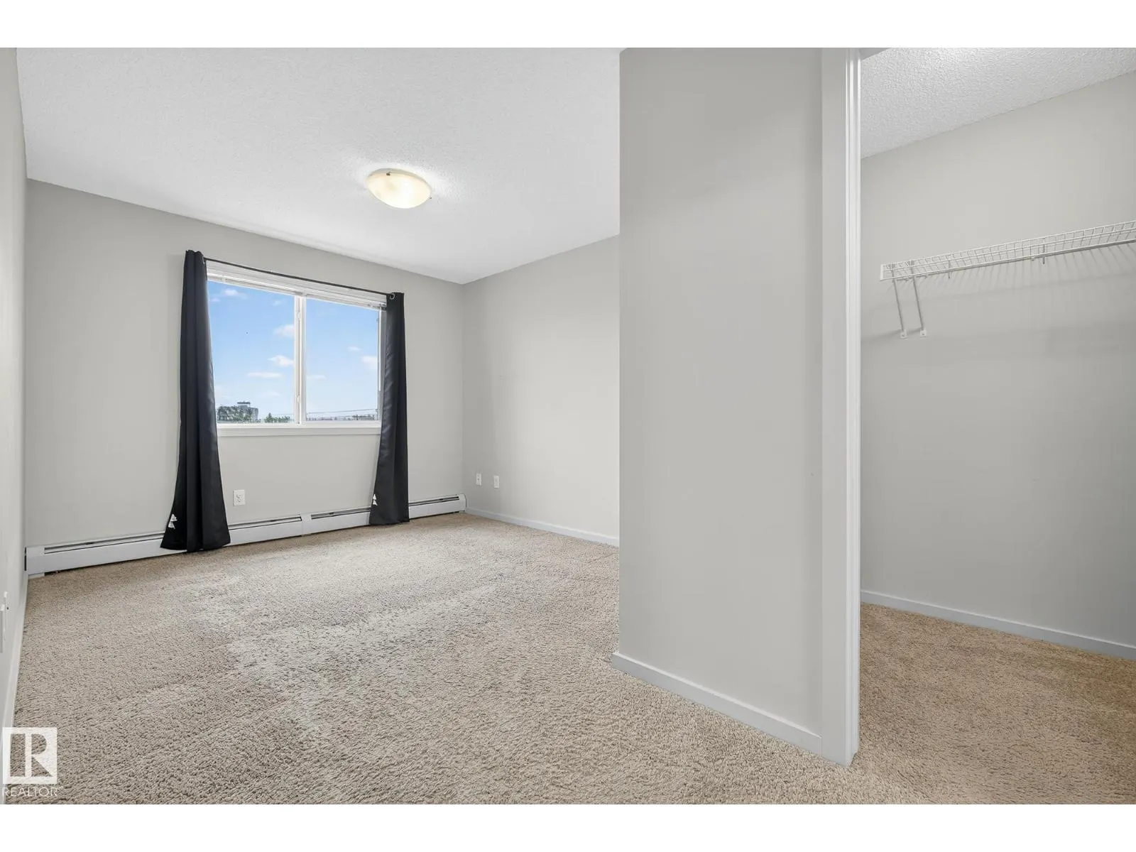 #402 7711 71 ST NW