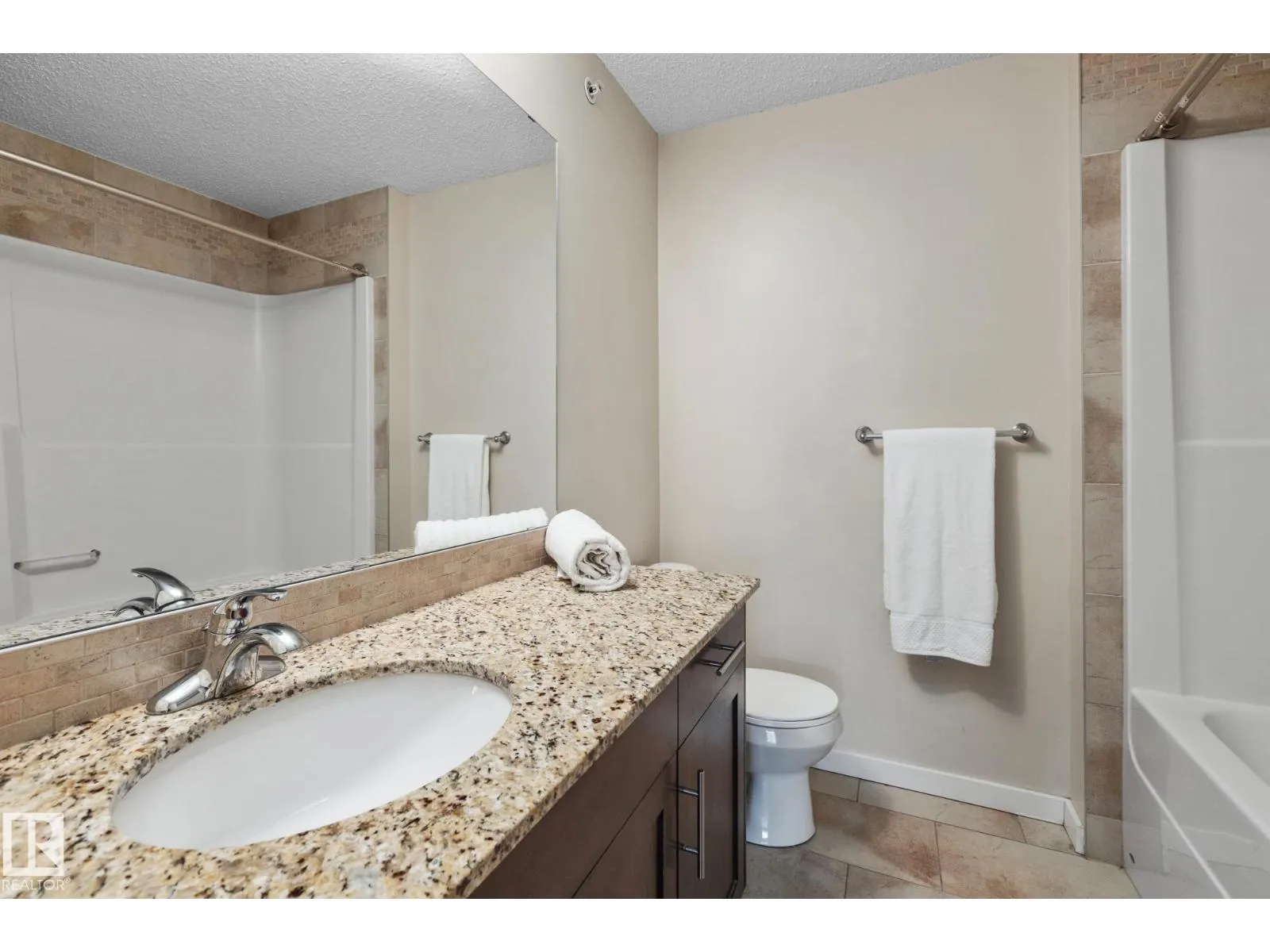 #402 10524 77 AV NW