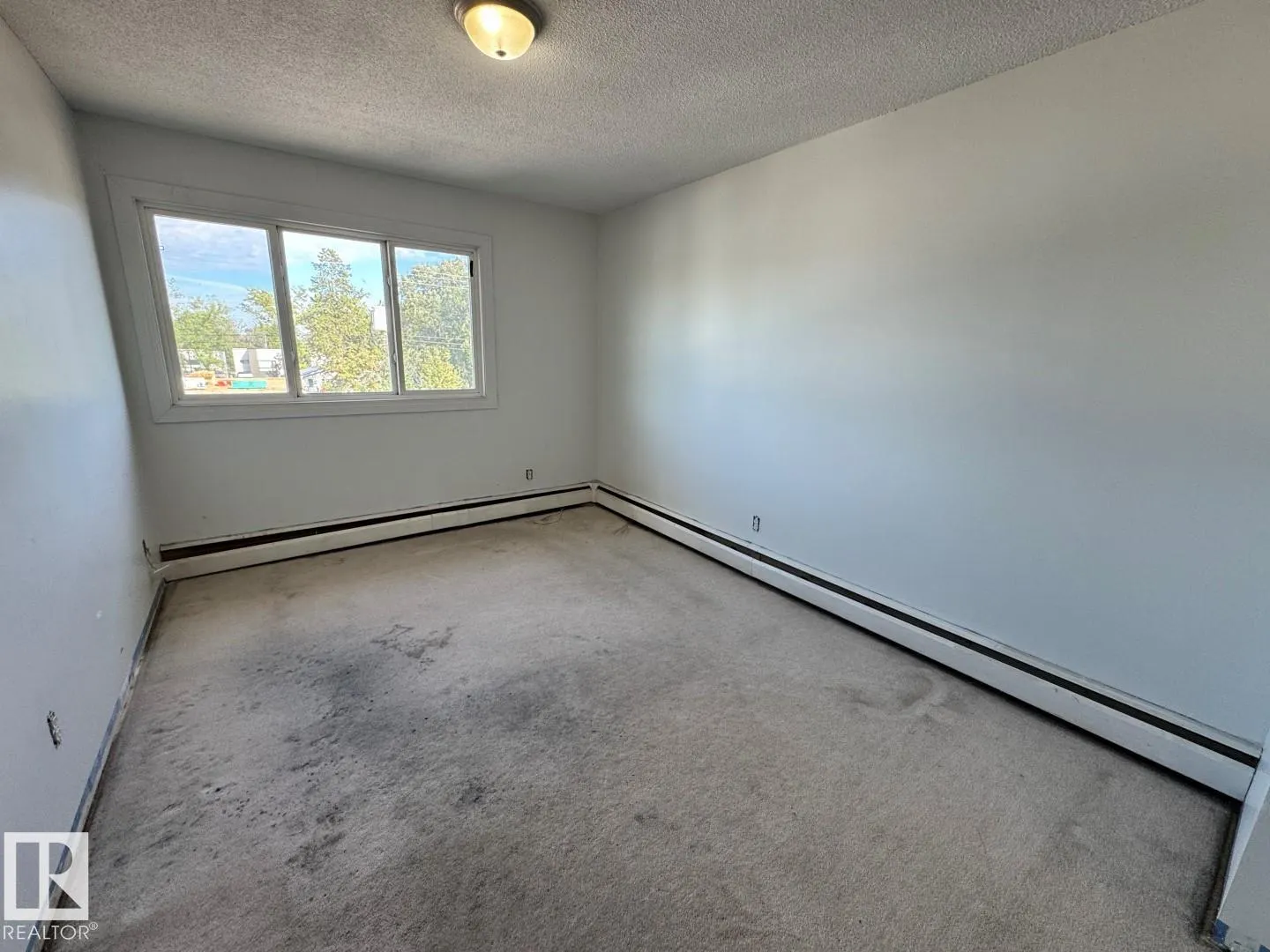 #205 11429 124 ST NW