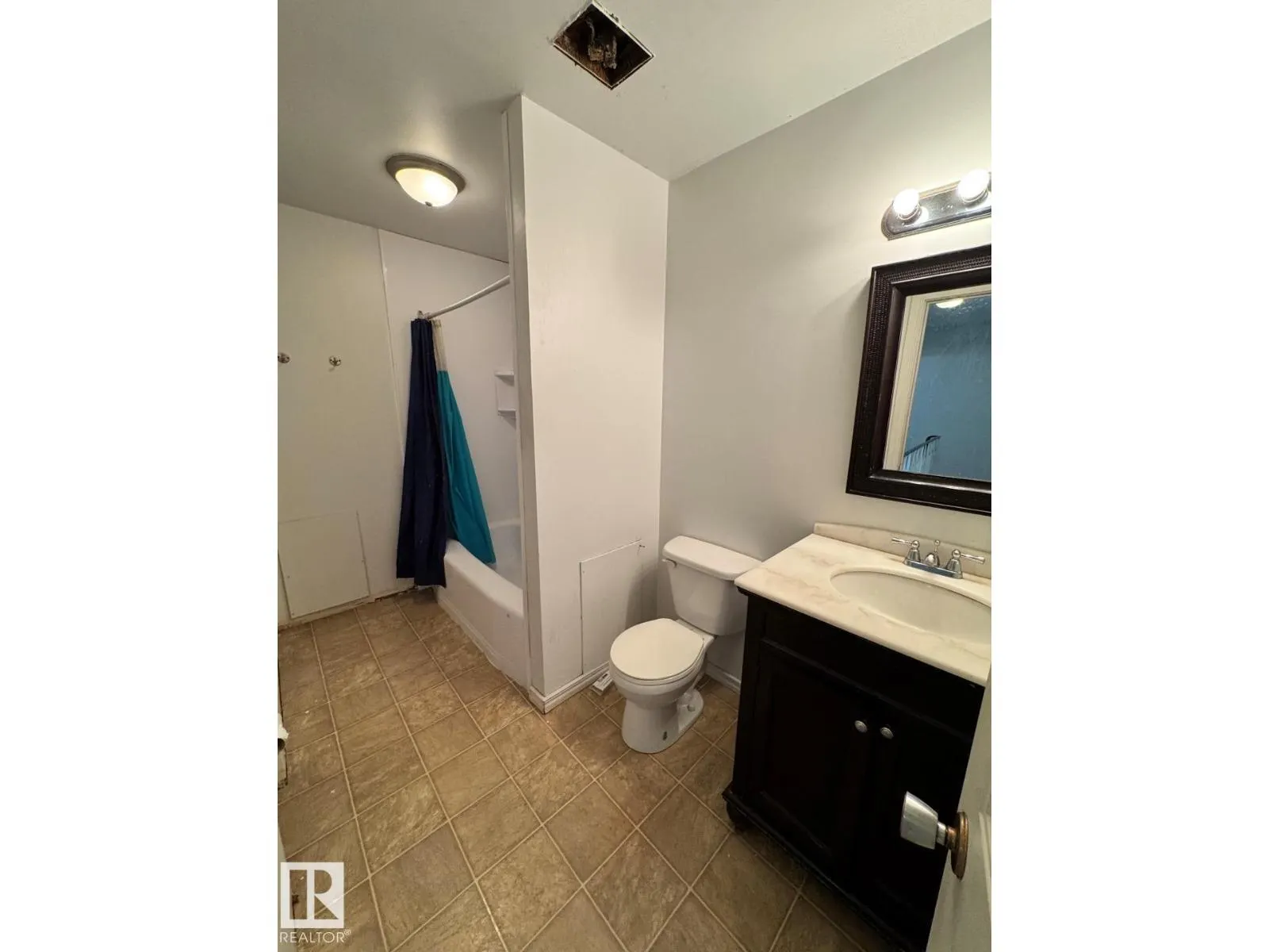 #205 11429 124 ST NW