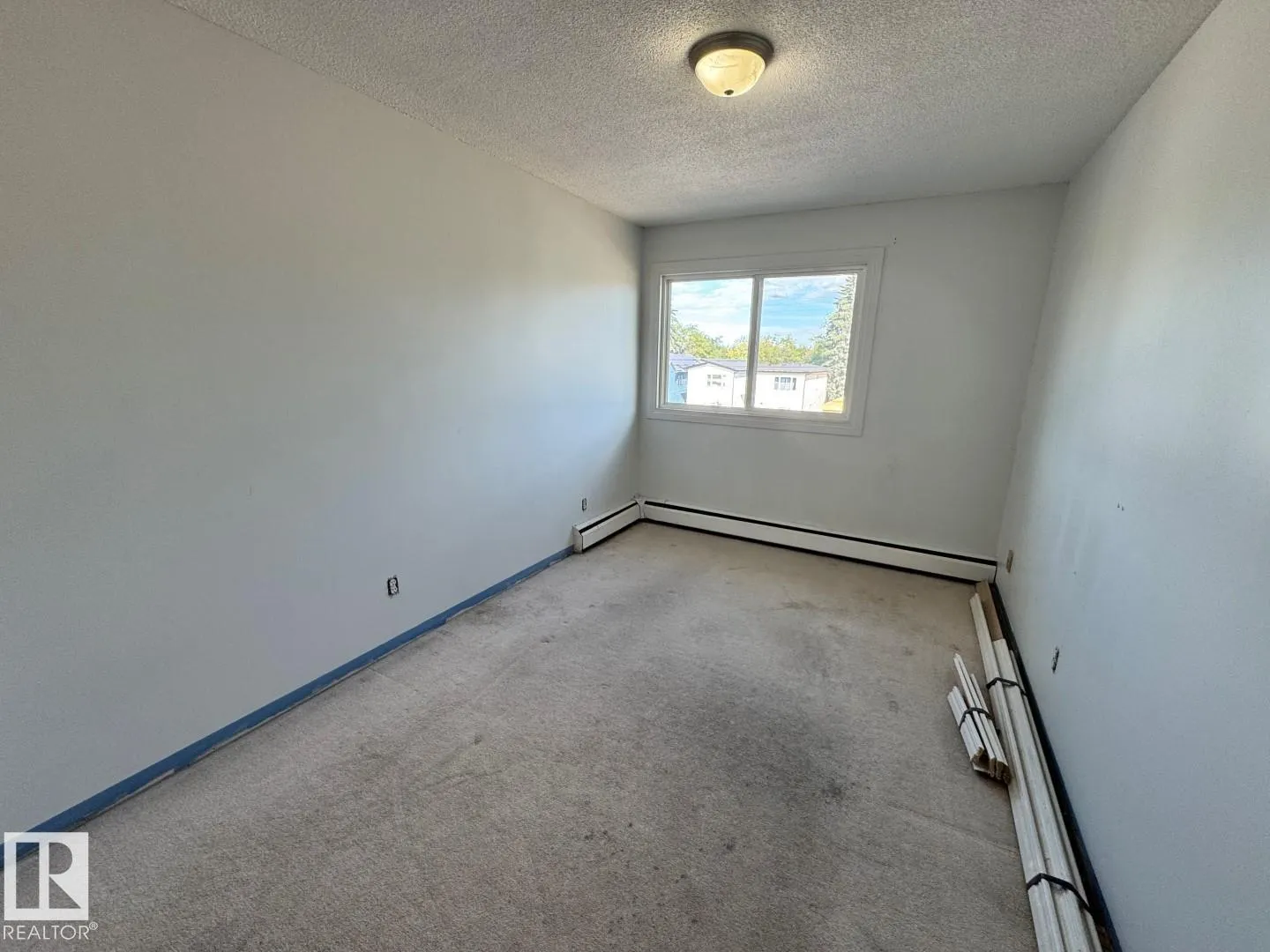 #205 11429 124 ST NW