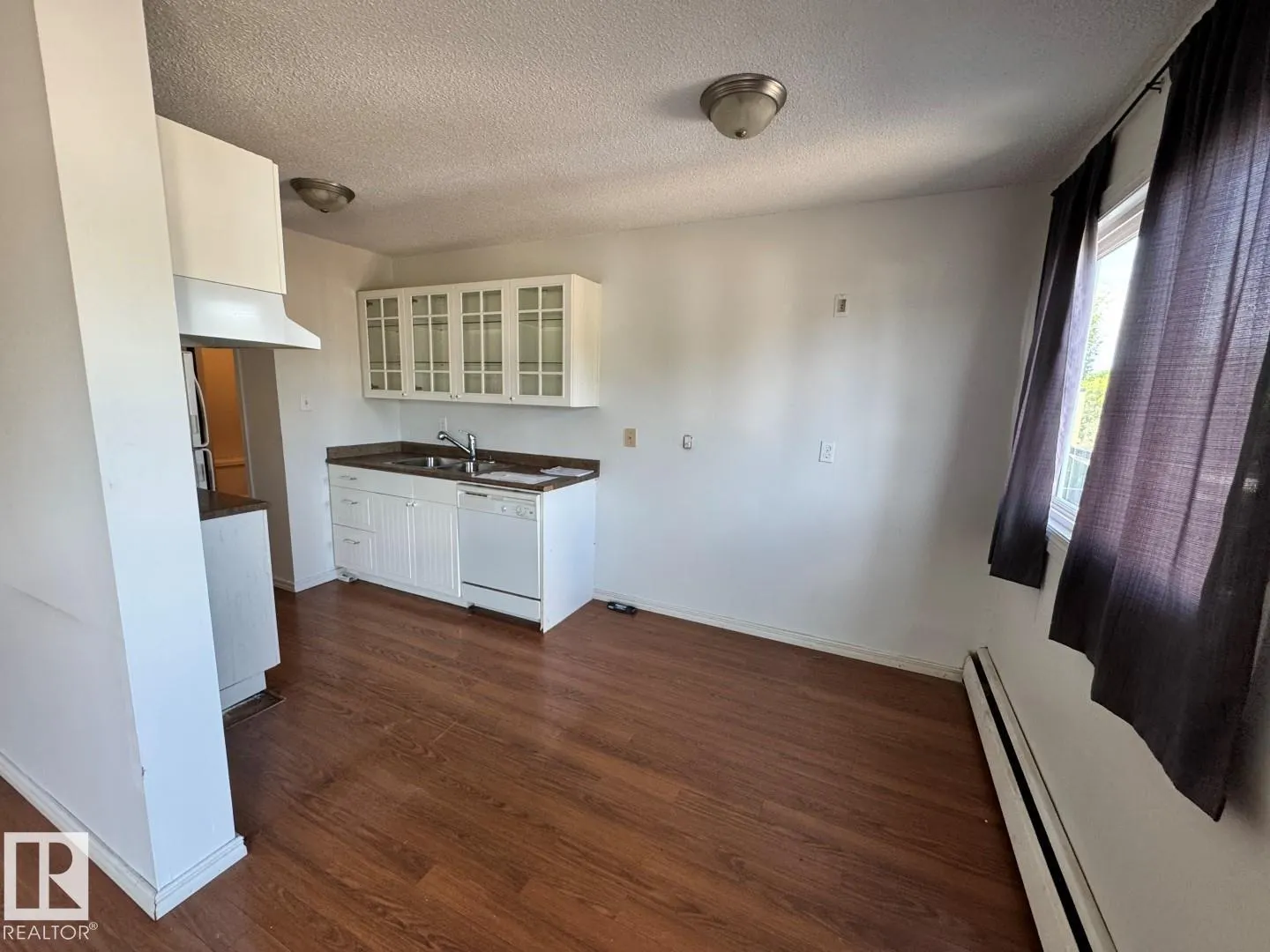 #205 11429 124 ST NW