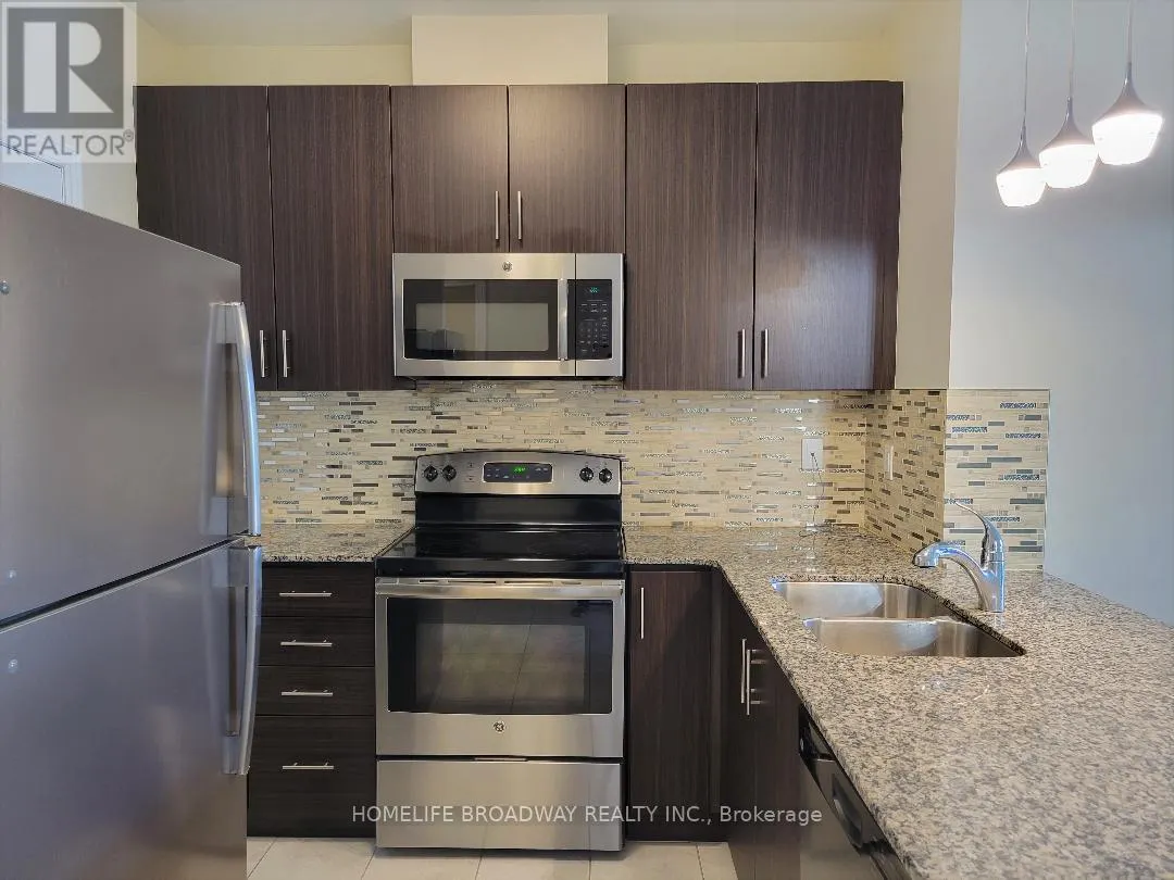 202 - 7768 KENNEDY ROAD