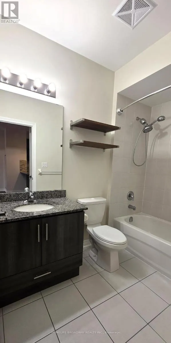 202 - 7768 KENNEDY ROAD