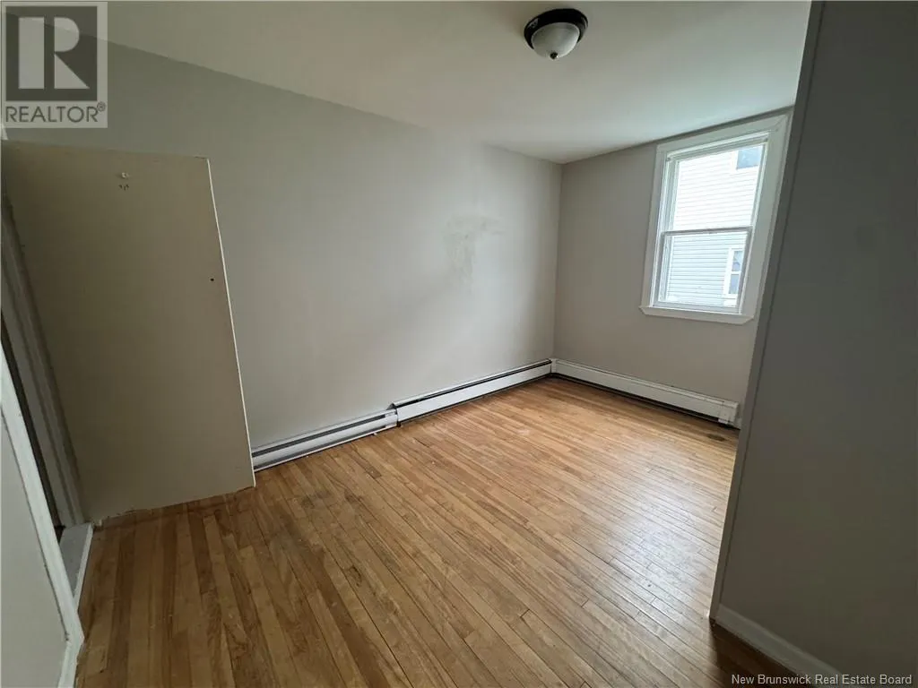 203 Queen Street W