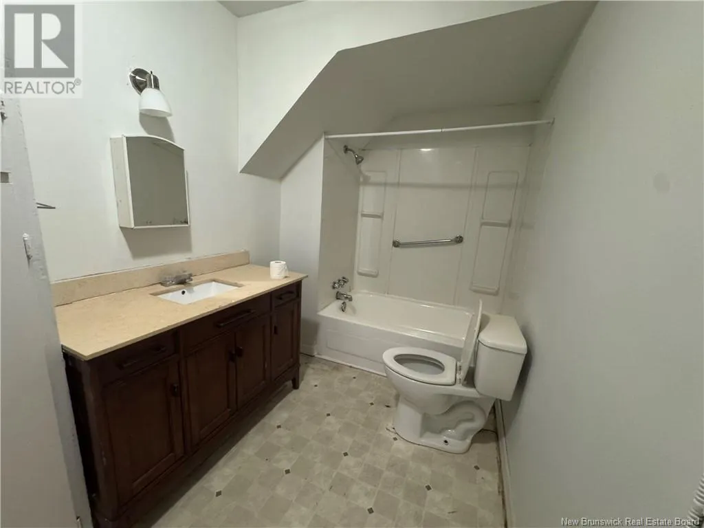 203 Queen Street W