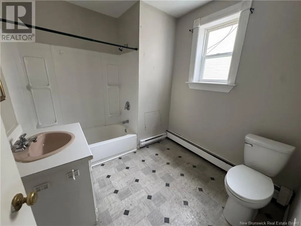 203 Queen Street W