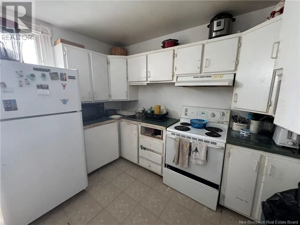 203 Queen Street W