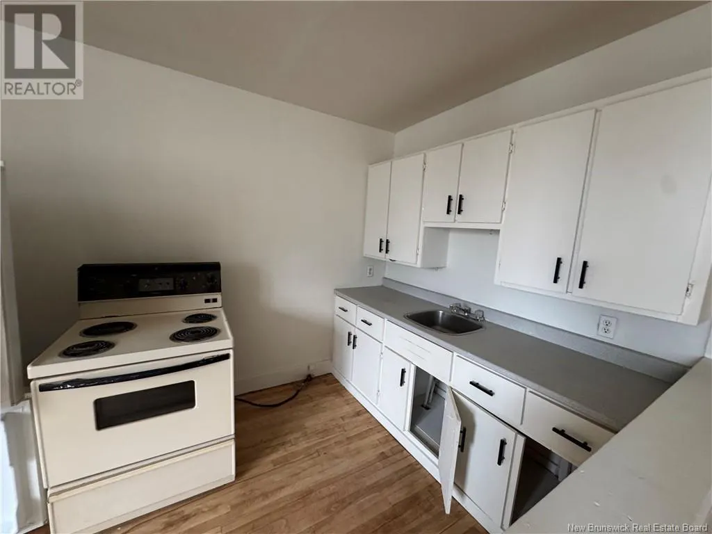 203 Queen Street W