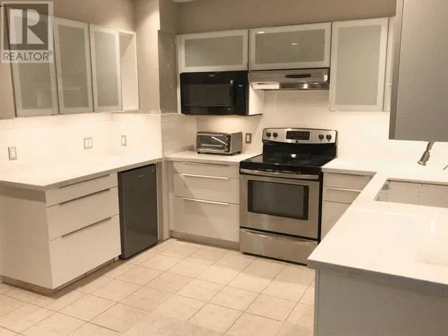 708 W 48TH AVENUE