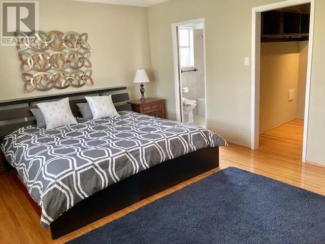 708 W 48TH AVENUE
