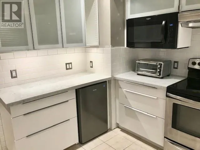 708 W 48TH AVENUE