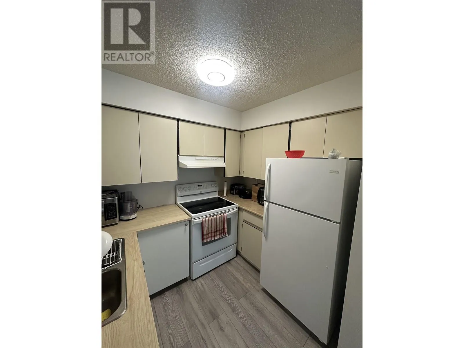 303 1948 COQUITLAM AVENUE