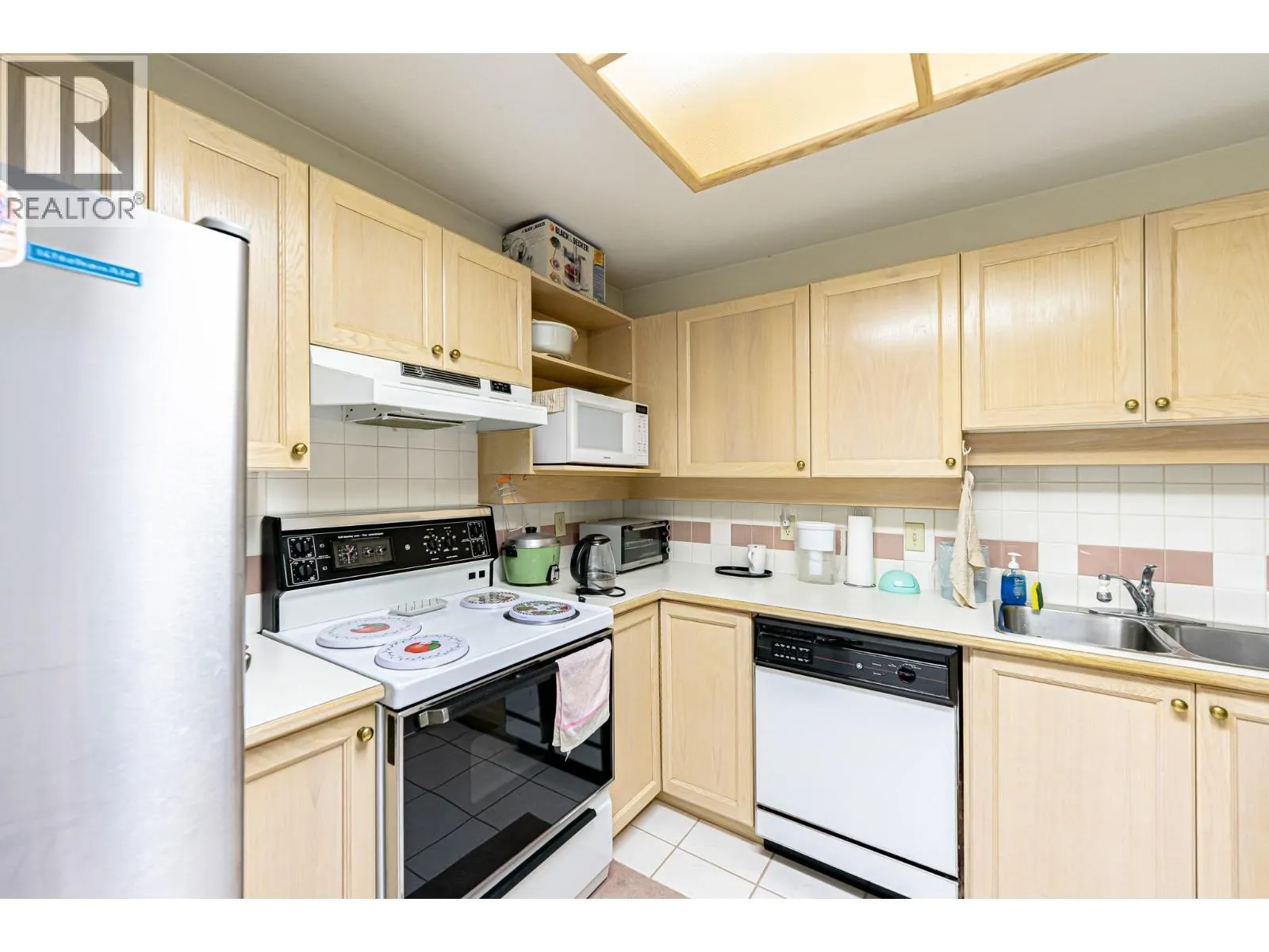 310 6737 STATION HILL COURT