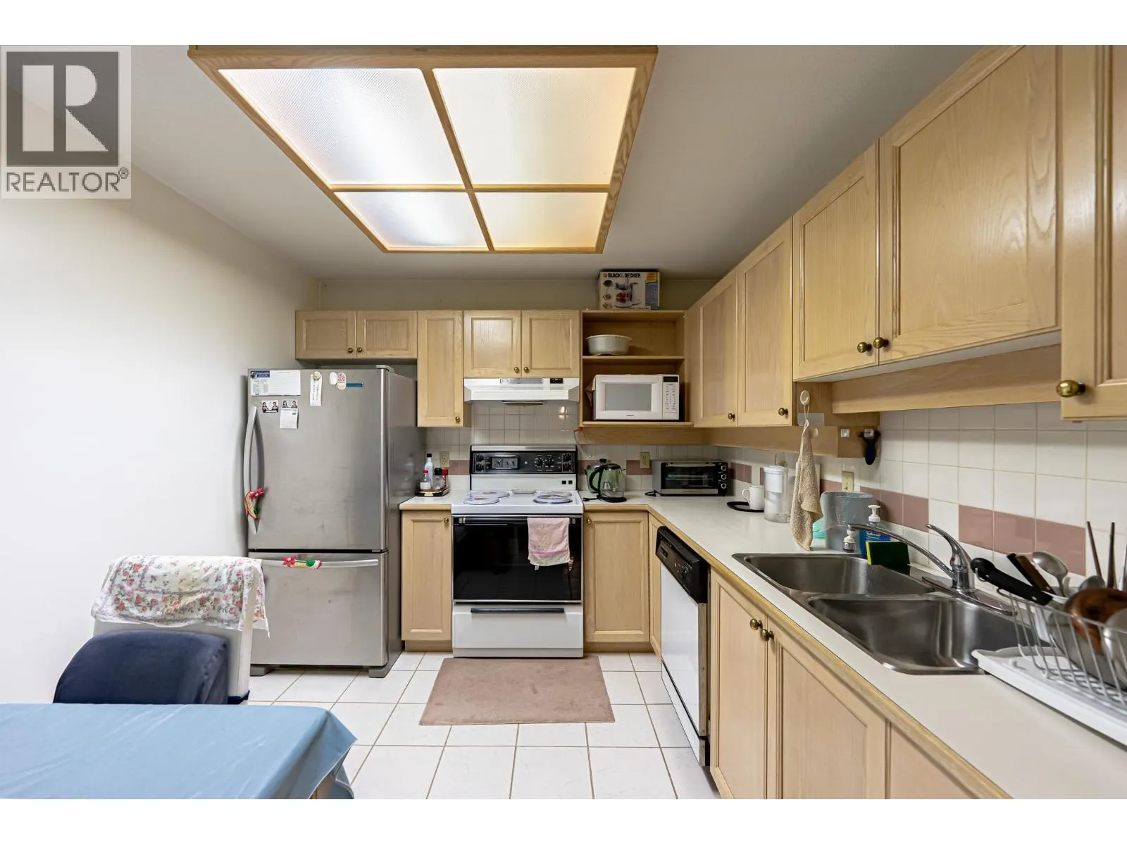 310 6737 STATION HILL COURT