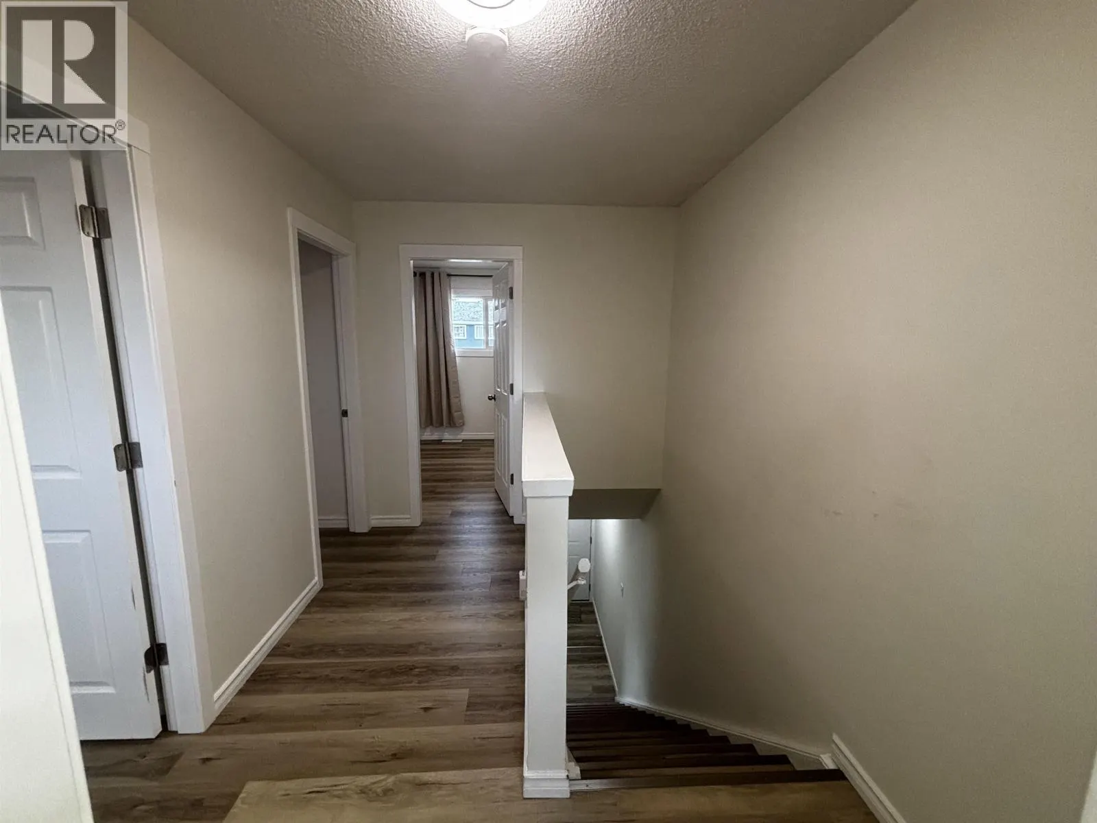 H122 1900 STRATHCONA AVENUE