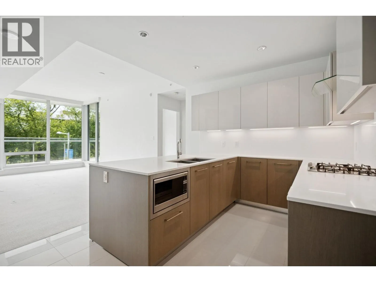 206 6611 PEARSON WAY