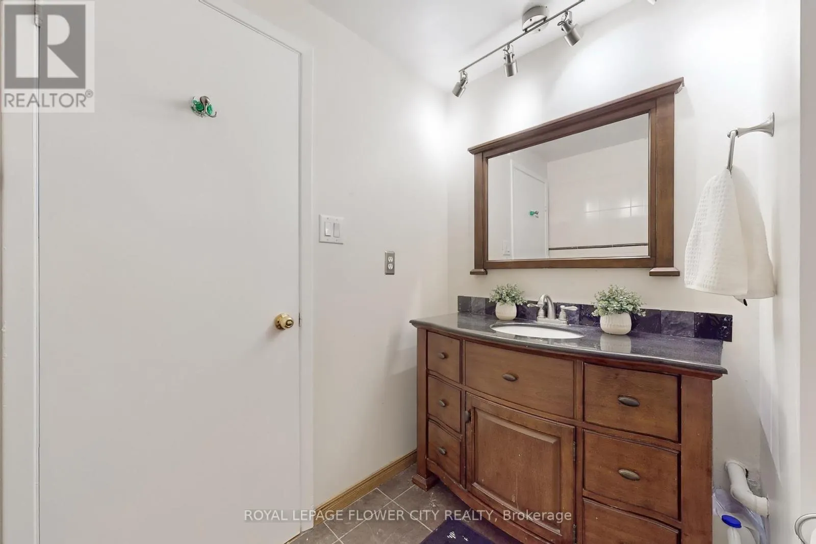 30 - 7077 ESTORIL ROAD