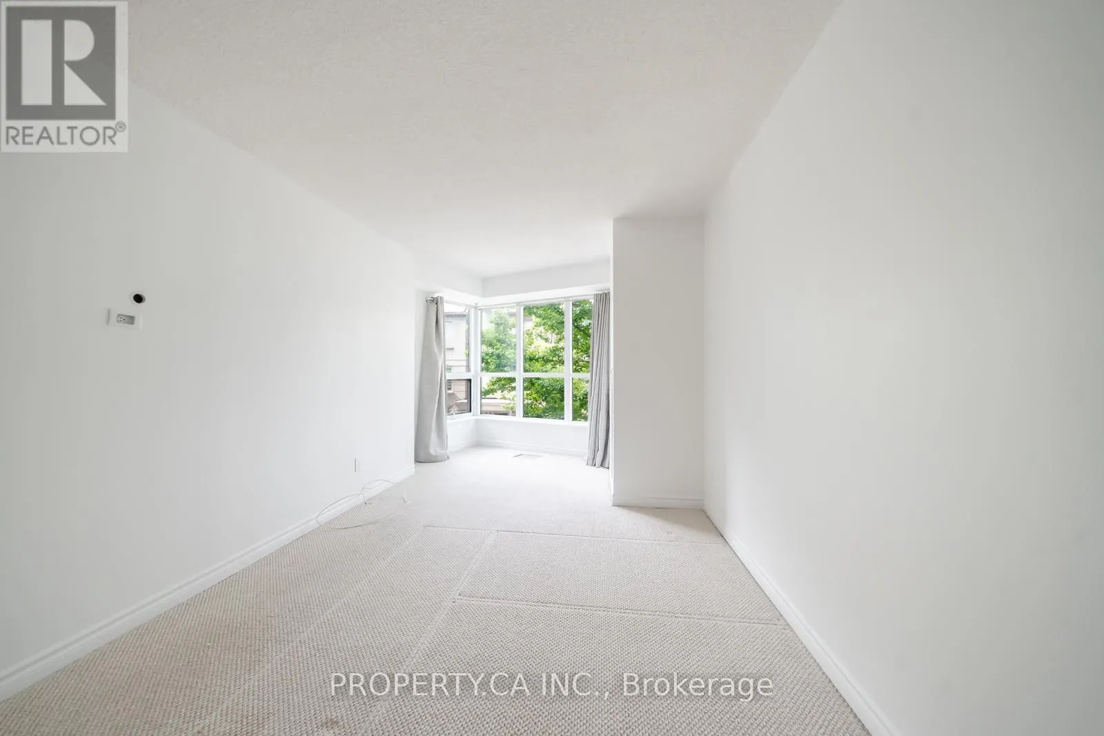 105 - 2111 LAKESHORE BOULEVARD W