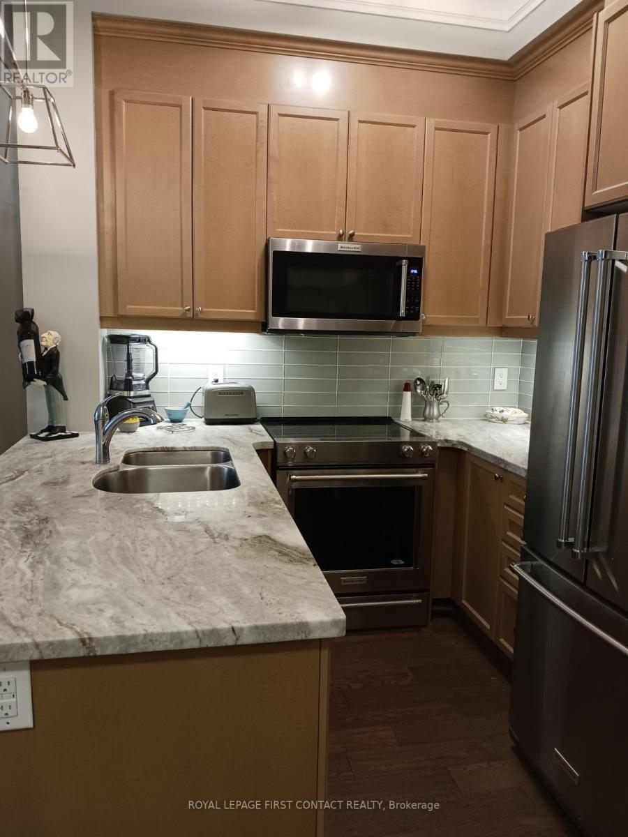 #101 -2300 UPPER MIDDLE RD W, #101