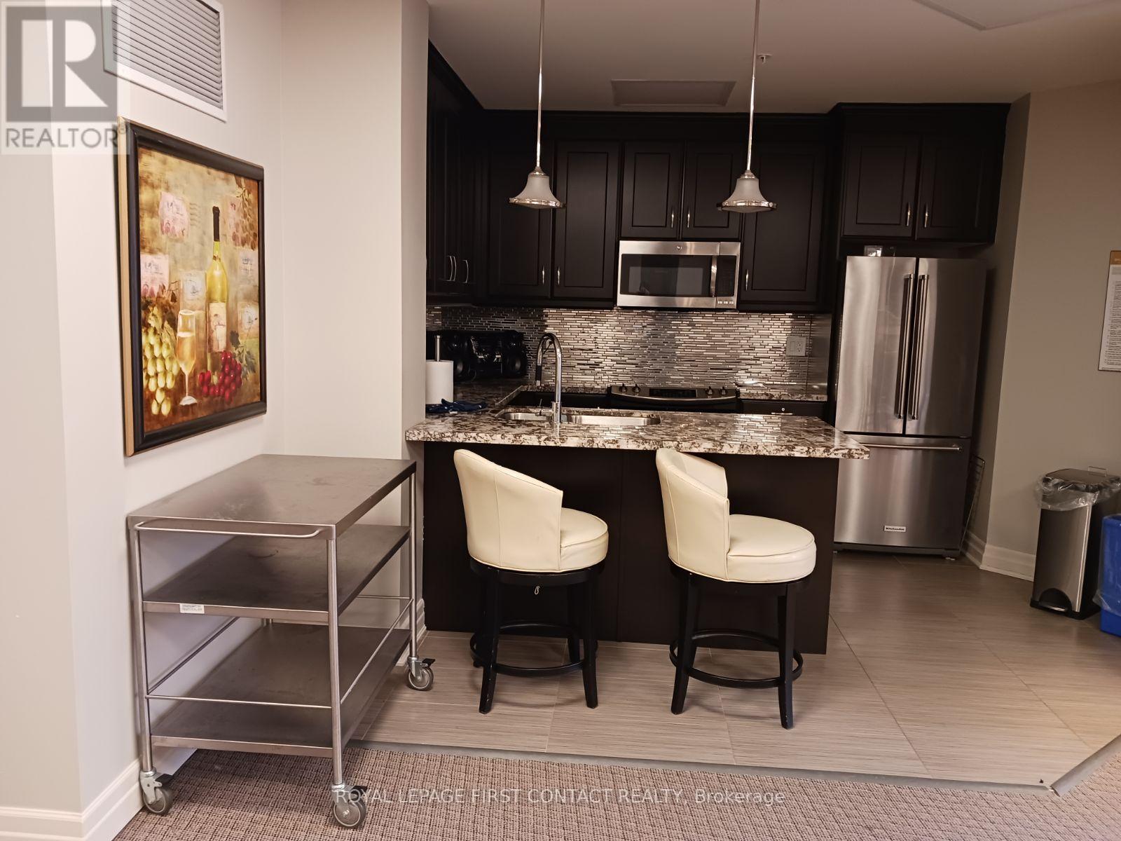 #101 -2300 UPPER MIDDLE RD W, #101