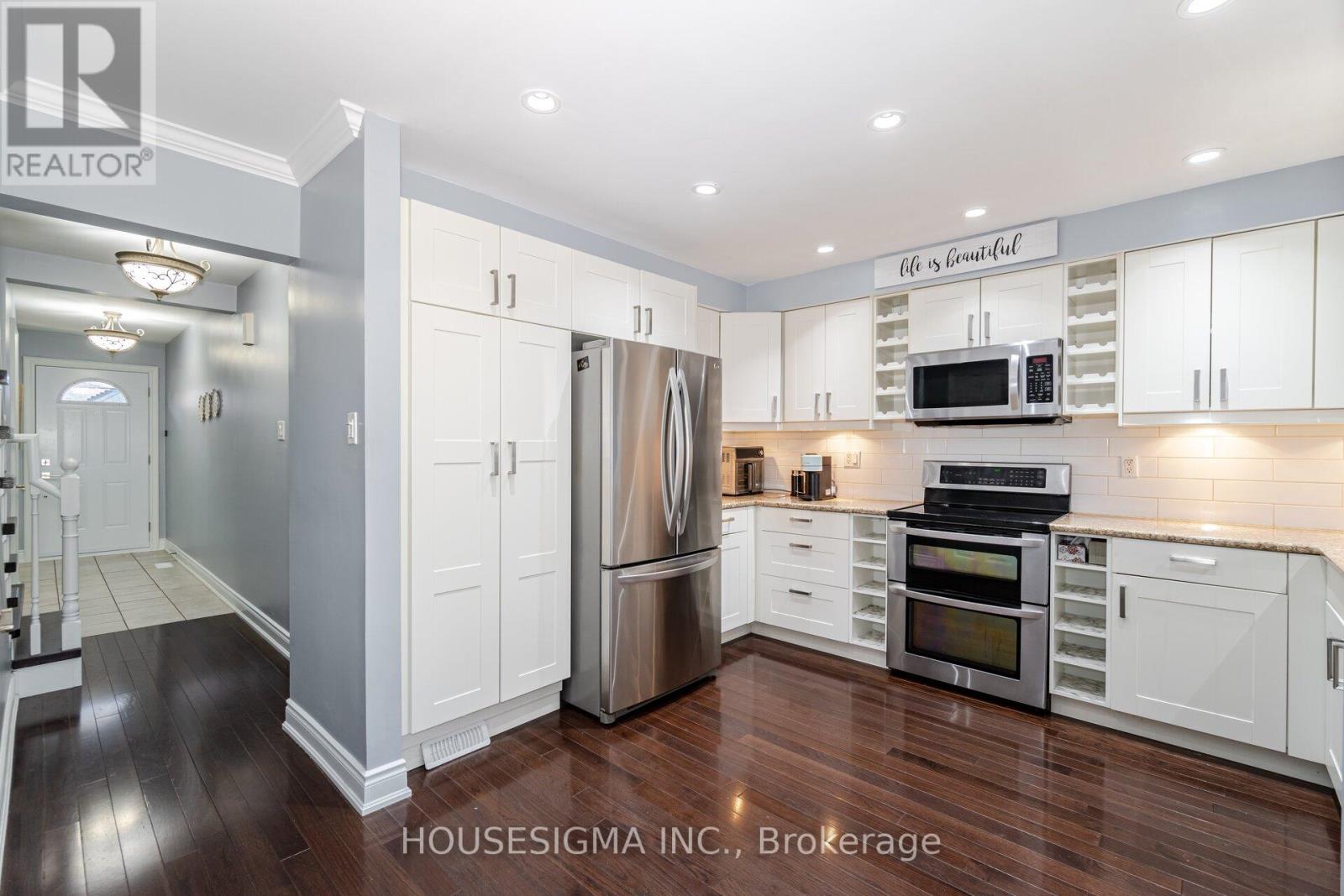 #125 -5910 GREENSBORO DR
