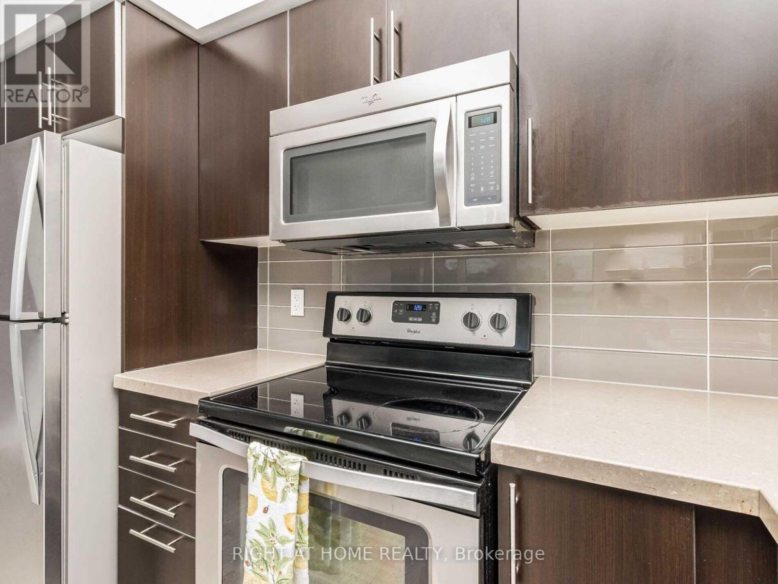 #203 -65 SPEERS RD, #203