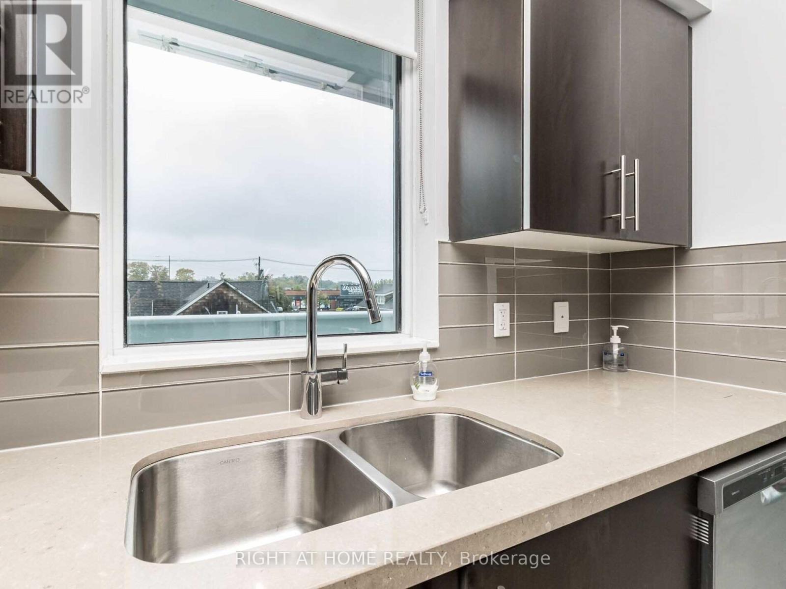 #203 -65 SPEERS RD, #203