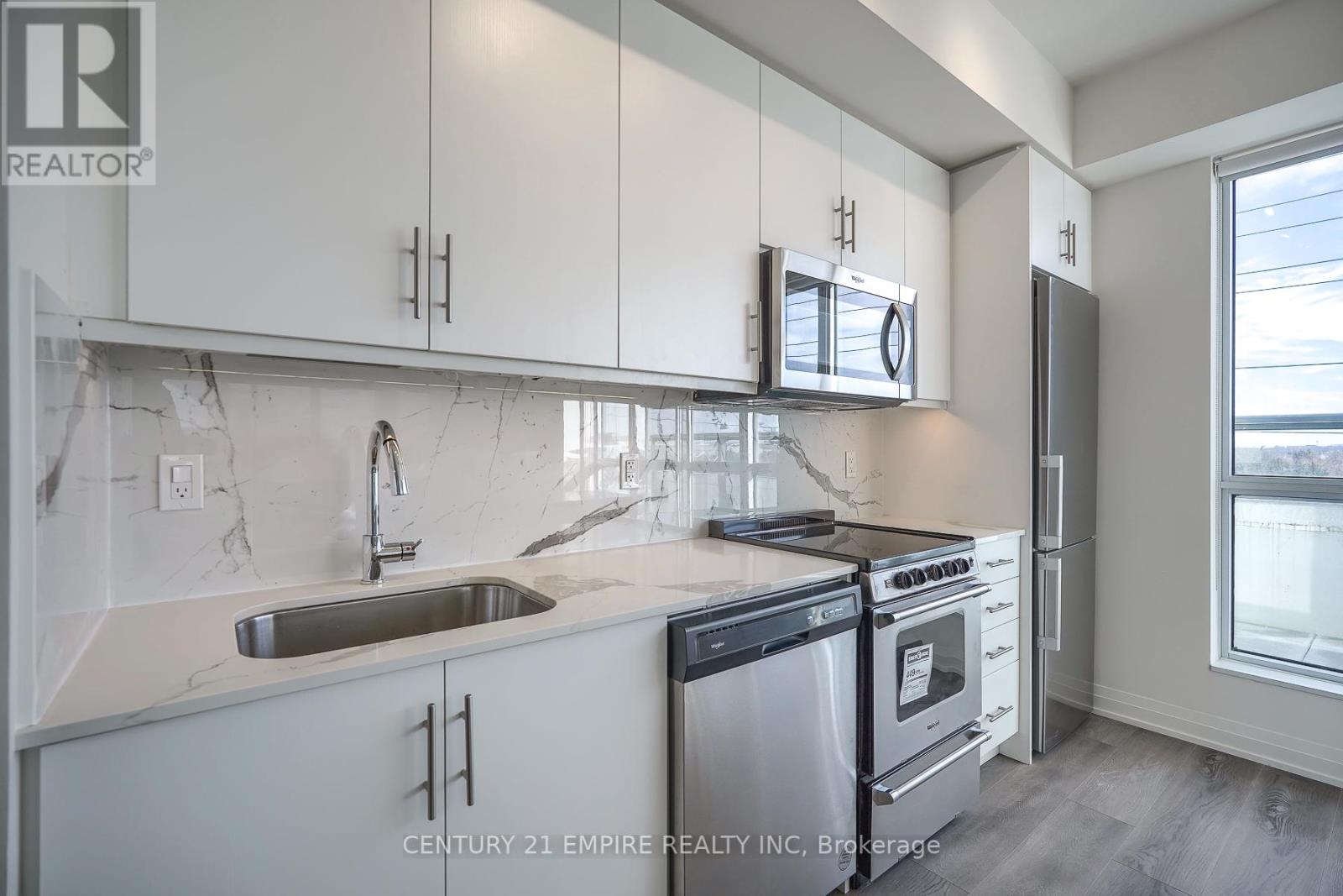 #306 -509 DUNDAS ST, #306