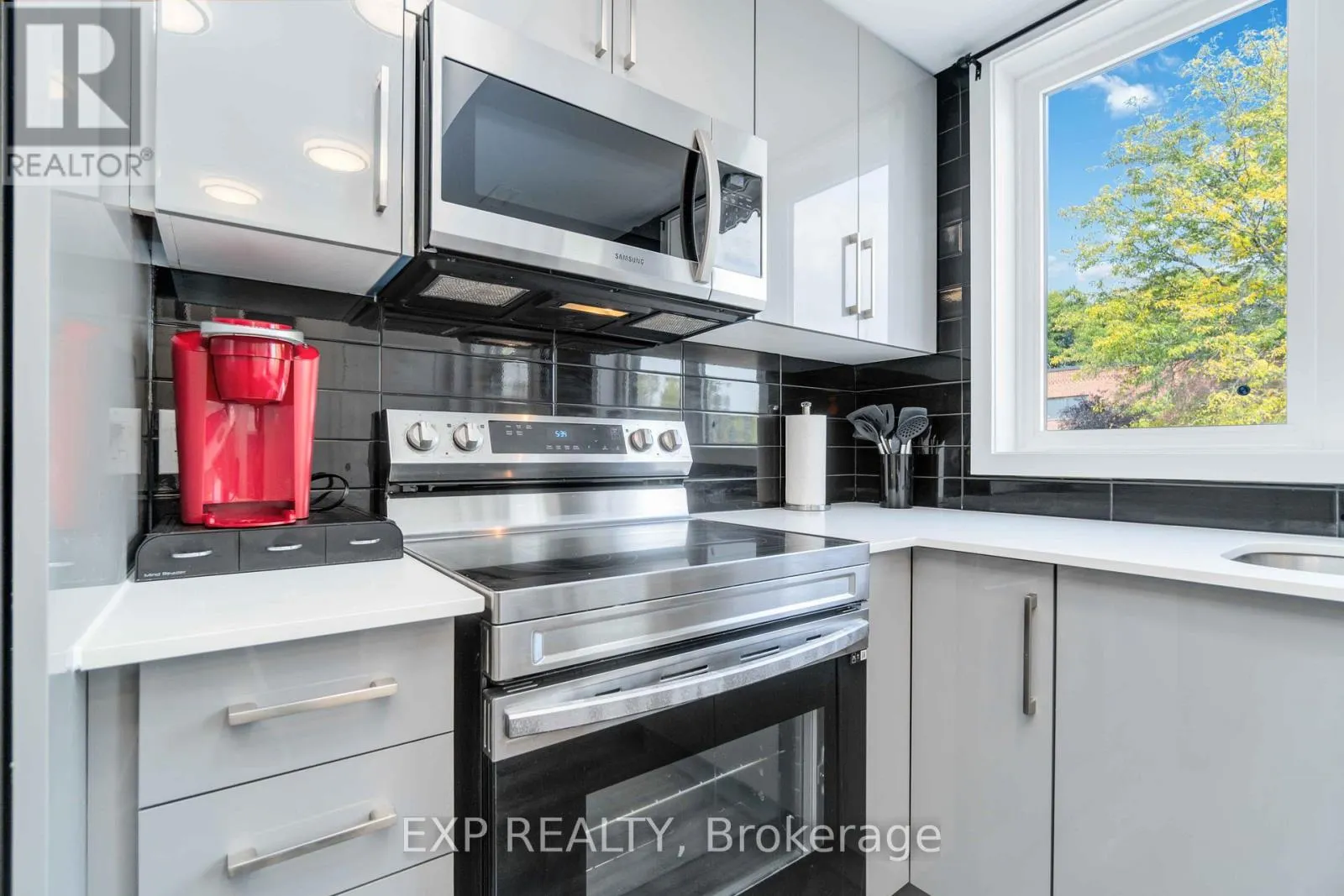312 - 6065 MCLEOD ROAD N